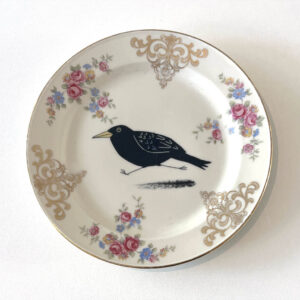 Bordje Rennende Merel